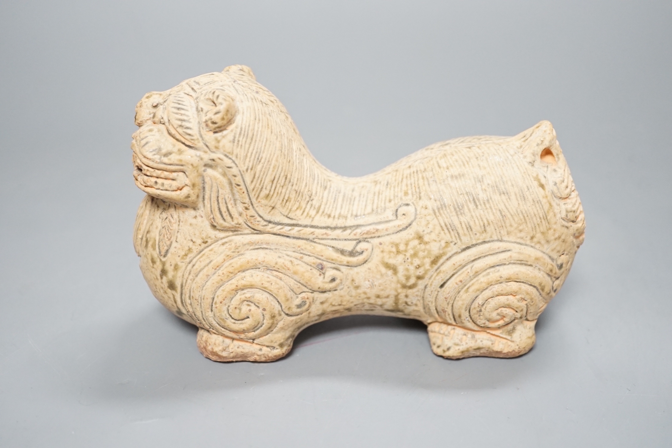 A Chinese green glazed 'lion-dog' - 15.5cm
